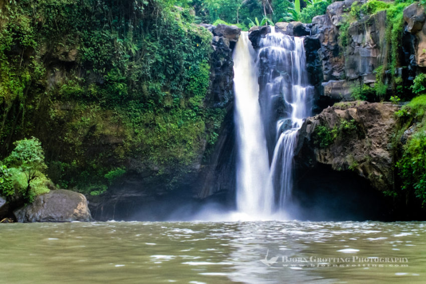 Bali, Gianyar, Tegenungan Waterfall. You can swim in the pool in front of the waterfall, the water is supposed to have magical powers.